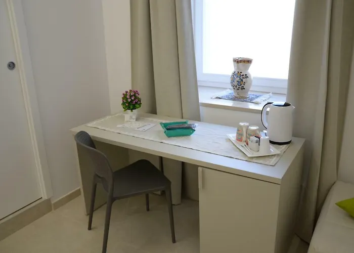 In & Out Affittacamere 4*